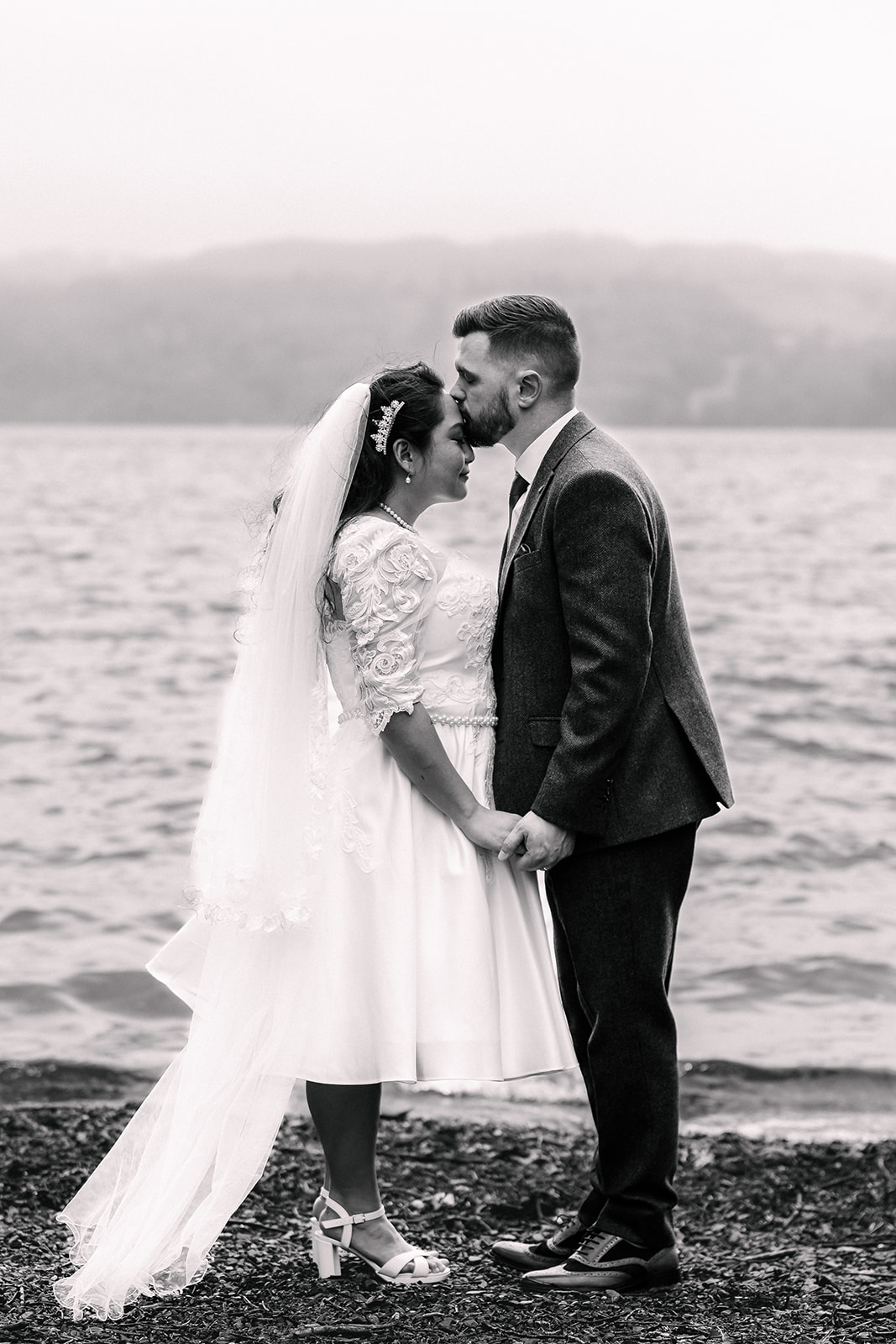 Emotional wedding photograph on Lake Windermere
